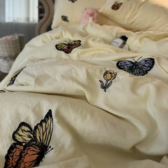 Advanced butterfly embroidered super soft water washing quilt bedding four -piece pure color bed sheet dormitory three -piece