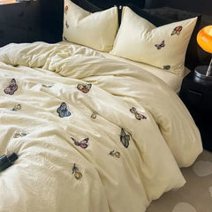 Advanced butterfly embroidered super soft water washing quilt bedding four -piece pure color bed sheet dormitory three -piece