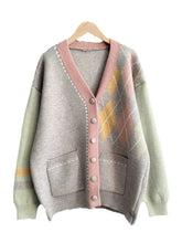 Harlequin Ribbed Hem Knitted Sweater