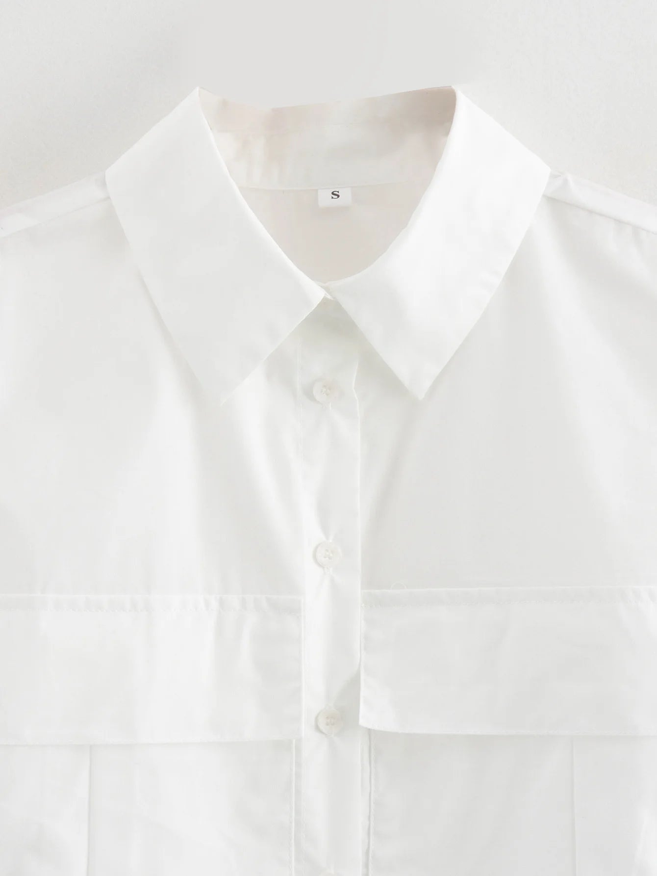 Solid Sleeveless Flip Pocket Short Top