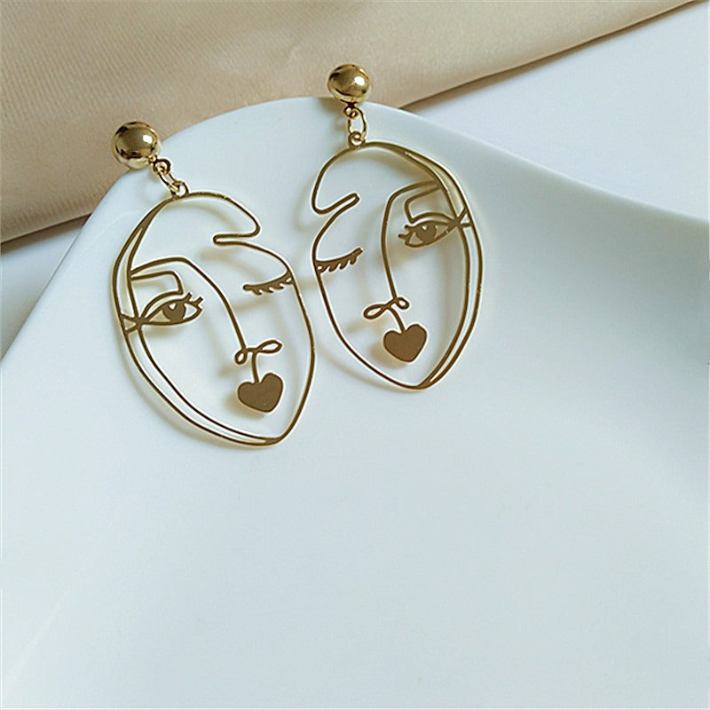 Wink Face Hollow Earrings