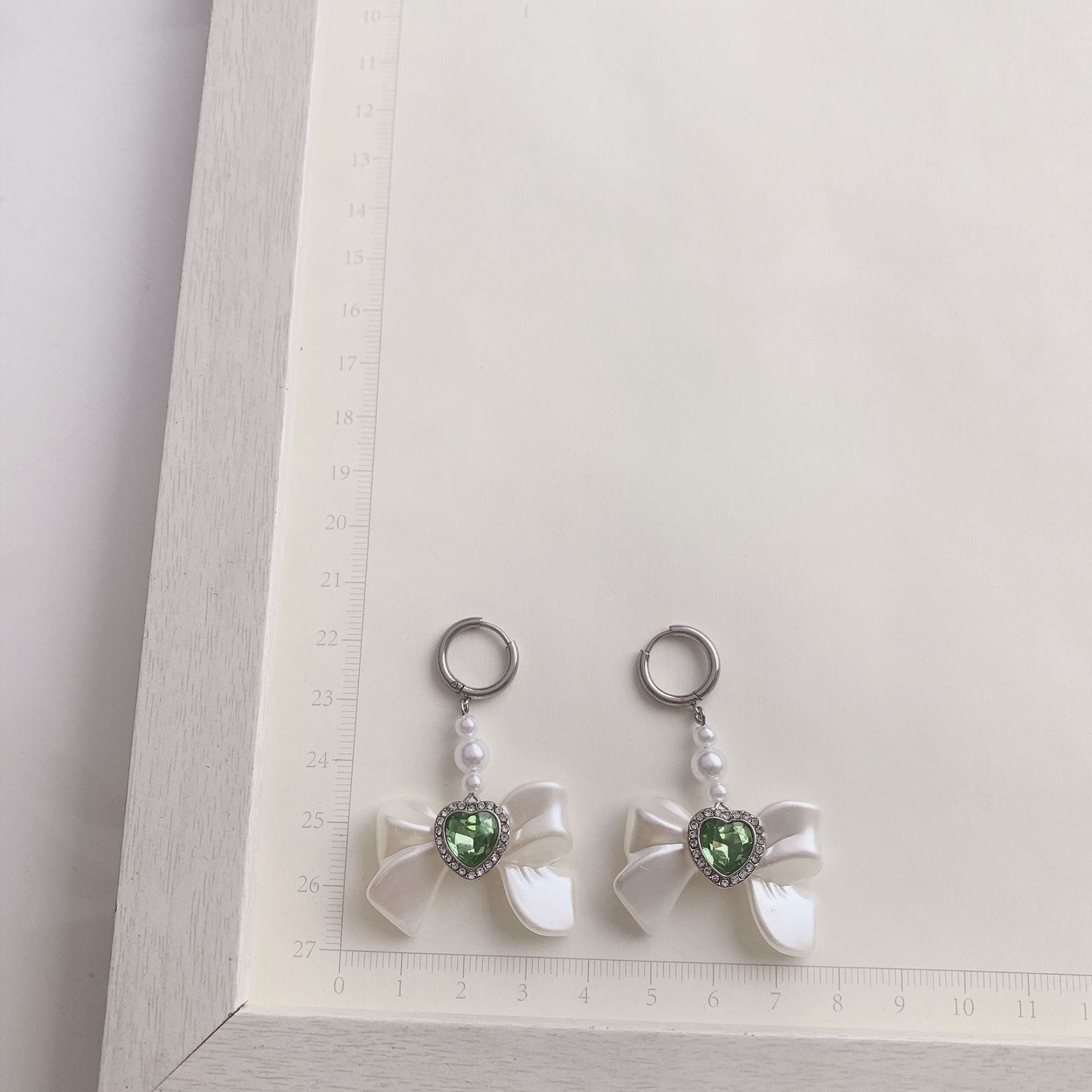 White Bow Hoop Earrings