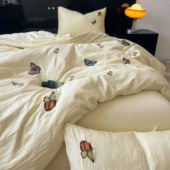 Advanced butterfly embroidered super soft water washing quilt bedding four -piece pure color bed sheet dormitory three -piece
